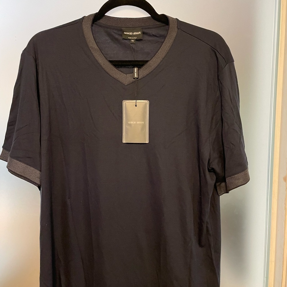 New With Tags
Georgio Armani short sleeve dress tee with detailed trim.